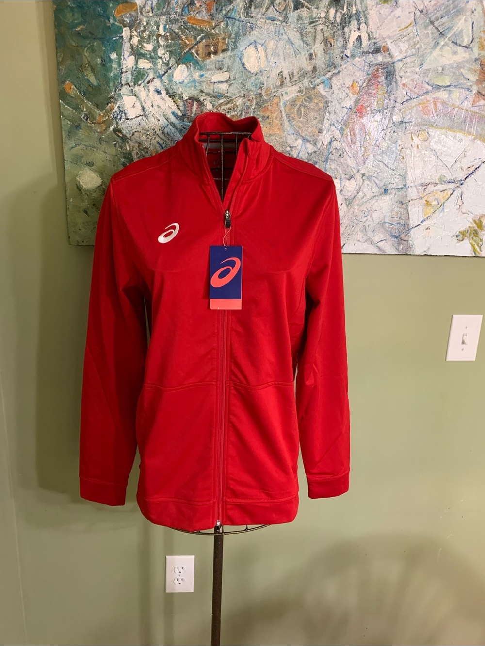 Ladies Asics zip up jacket in size M. NWT